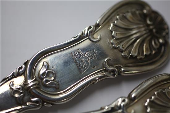 A matched pair of Victorian silver double struck scroll rosette pattern basting spoons, 12.5 oz.